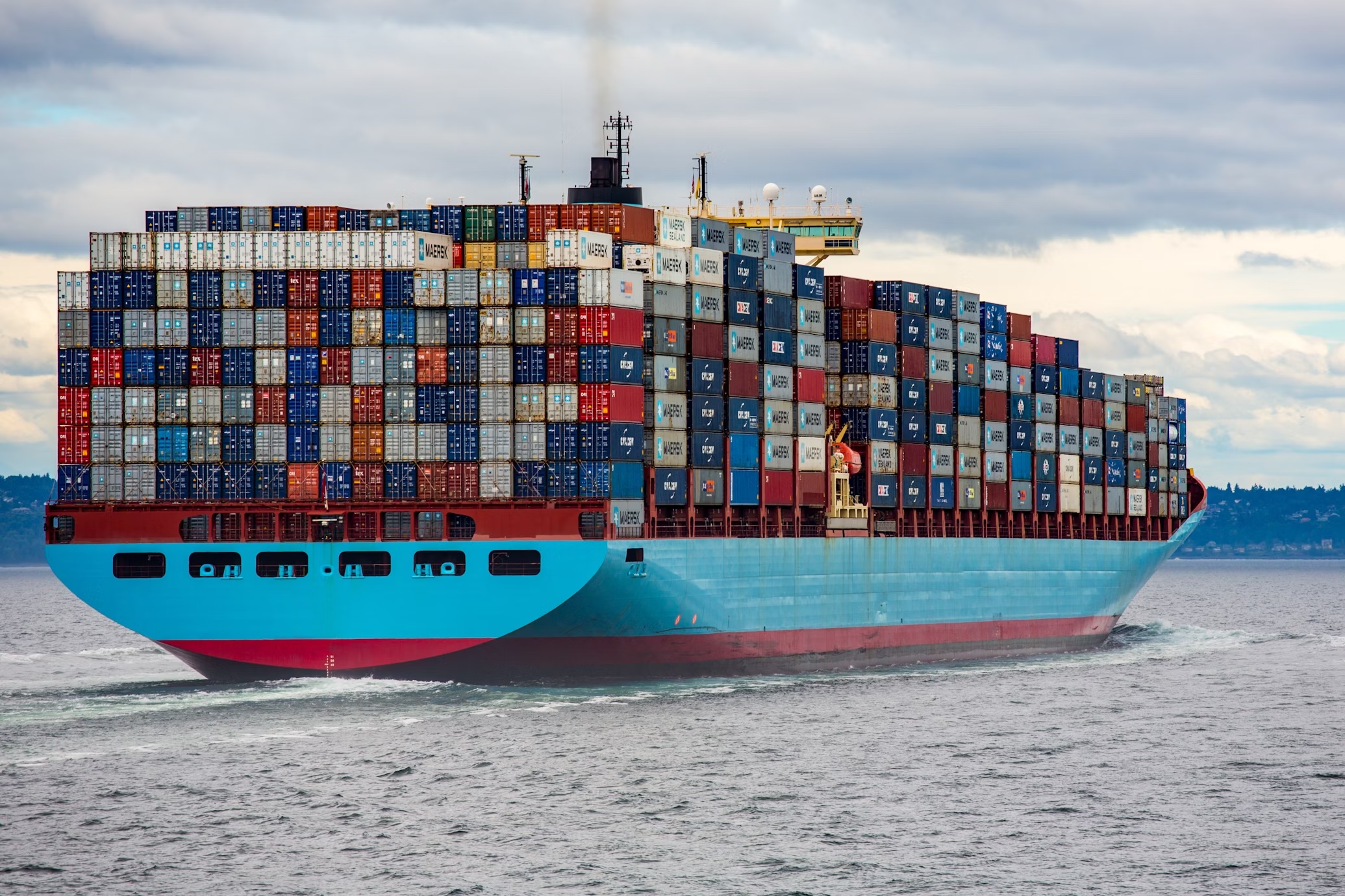 Large container ship carrying international cargo for ocean freight and global shipping