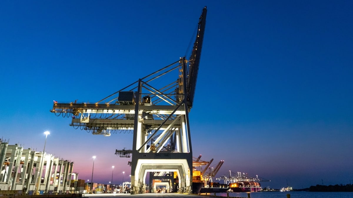 Quay cranes at a container terminal for sea freight scheduling