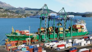 Container ship loading at a port terminal for sea freight delivery planning