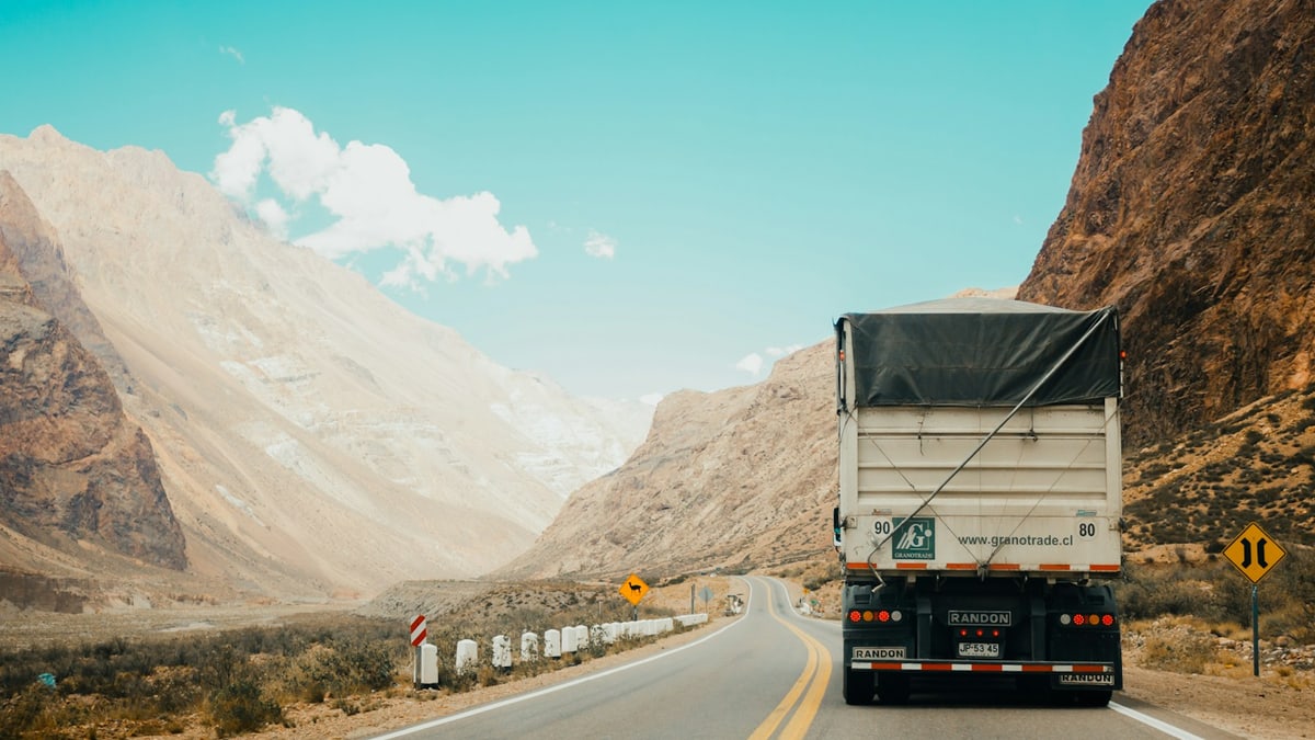 Container truck used for freight delivery coordination
